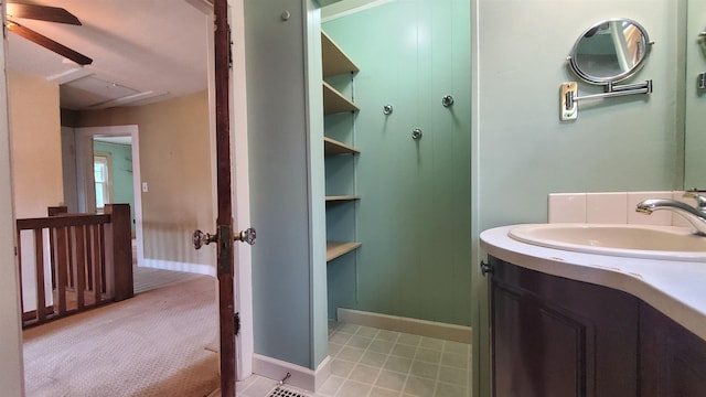 447 Englewood Ct, Fort Wayne, IN 46807 - bathroom with a ceiling fan, baseboards, and vanity