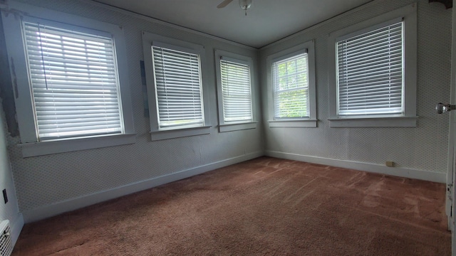 447 Englewood Ct, Fort Wayne, IN 46807 - carpeted spare room featuring baseboards and a ceiling fan