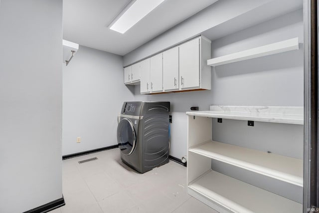 9531 Ledge Wood Ct, Fort Wayne, IN 46804 - washroom featuring washer / clothes dryer, cabinet space, and baseboards