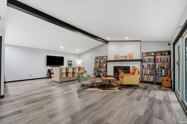 9531 Ledge Wood Ct, Fort Wayne, IN 46804 - living room featuring wood finished floors, a fireplace, and recessed lighting