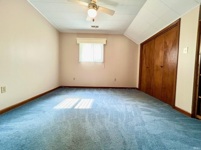 1405 19th St, Bedford, IN 47421 - unfurnished bedroom featuring carpet flooring, baseboards, a ceiling fan, and a closet