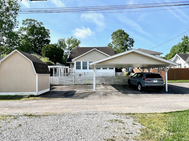1405 19th St, Bedford, IN 47421 - view of front of property featuring a carport and driveway