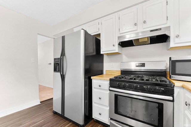 6420 Londonderry Ln, Fort Wayne, IN 46835 - kitchen featuring appliances with stainless steel finishes, under cabinet range hood, white cabinets, dark wood-style flooring, and baseboards