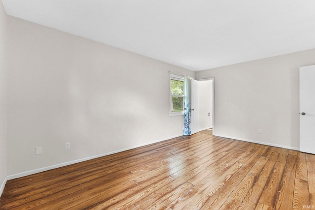6420 Londonderry Ln, Fort Wayne, IN 46835 - unfurnished room with hardwood / wood-style flooring and baseboards