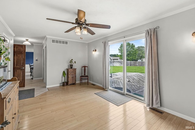 54062 Stonebridge Dr, Elkhart, IN 46514 - interior space featuring a ceiling fan, light wood-style flooring, ornamental molding, and baseboards