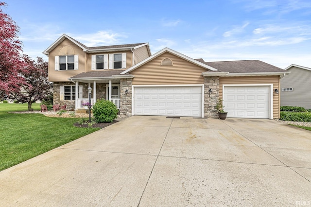 54062 Stonebridge Dr, Elkhart, IN 46514 - traditional home with a porch, driveway, a garage, stone siding, and a front lawn
