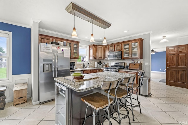 54062 Stonebridge Dr, Elkhart, IN 46514 - kitchen with stainless steel appliances, beverage cooler, a sink, light tile patterned flooring, and ornamental molding