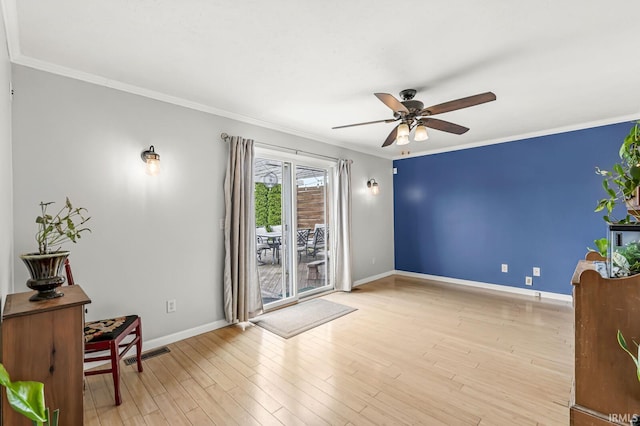 54062 Stonebridge Dr, Elkhart, IN 46514 - sitting room with ceiling fan, crown molding, baseboards, and light wood-type flooring