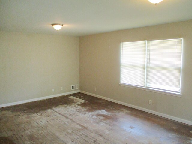 1103 S Jersey Ave, Muncie, IN 47302 - unfurnished room with baseboards and wood finished floors