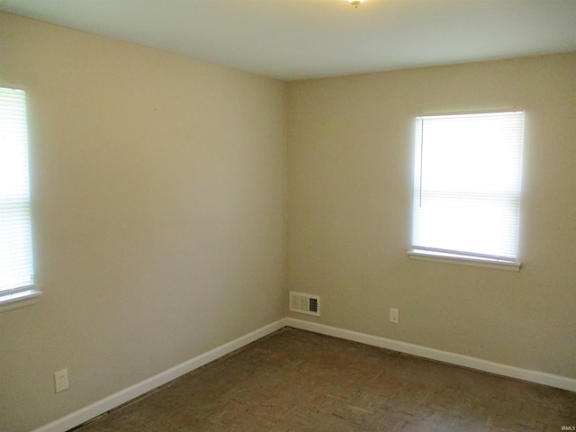 1103 S Jersey Ave, Muncie, IN 47302 - empty room with baseboards