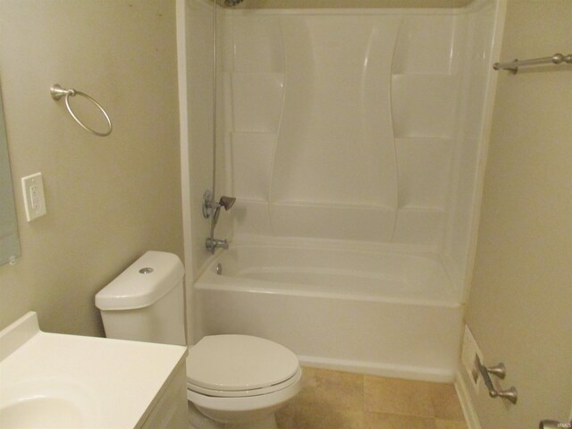 1103 S Jersey Ave, Muncie, IN 47302 - bathroom featuring vanity, toilet, and tub / shower combination