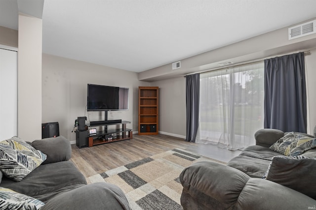 2106 Bayside Ct, Fort Wayne, IN 46804 - living room featuring wood finished floors and baseboards