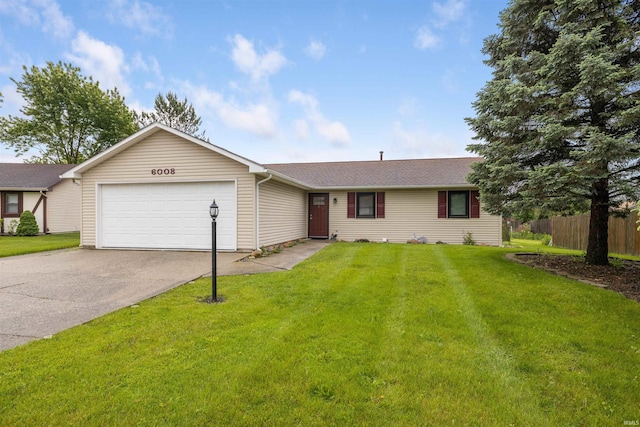 6008 Hinsdale Ln, Fort Wayne, IN 46835 - ranch-style house featuring a garage and asphalt driveway