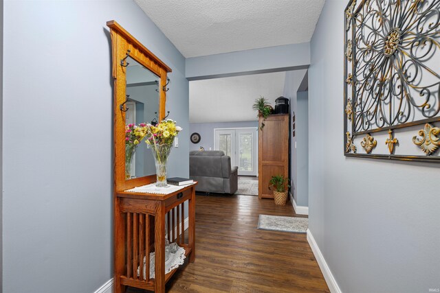 6008 Hinsdale Ln, Fort Wayne, IN 46835 - corridor featuring dark wood-style flooring, baseboards, and a textured ceiling