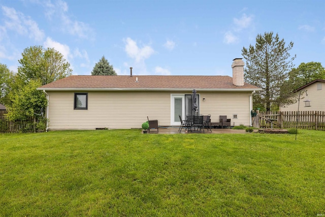 6008 Hinsdale Ln, Fort Wayne, IN 46835 - rear view of house featuring a patio and a chimney
