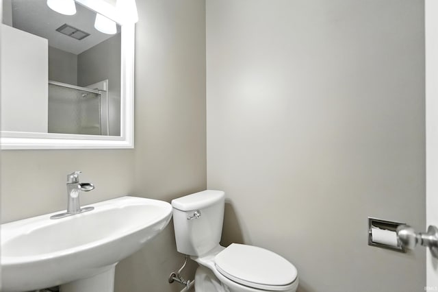 2882 E Hickory Ln, Columbia City, IN 46725 - full bathroom with a sink, toilet, and an enclosed shower