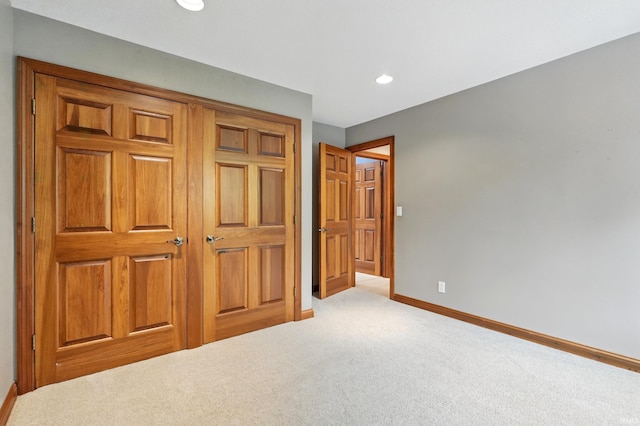 2882 E Hickory Ln, Columbia City, IN 46725 - unfurnished bedroom with carpet floors, baseboards, and recessed lighting
