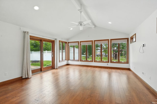 2882 E Hickory Ln, Columbia City, IN 46725 - unfurnished living room with a ceiling fan, wood-type flooring, and baseboards