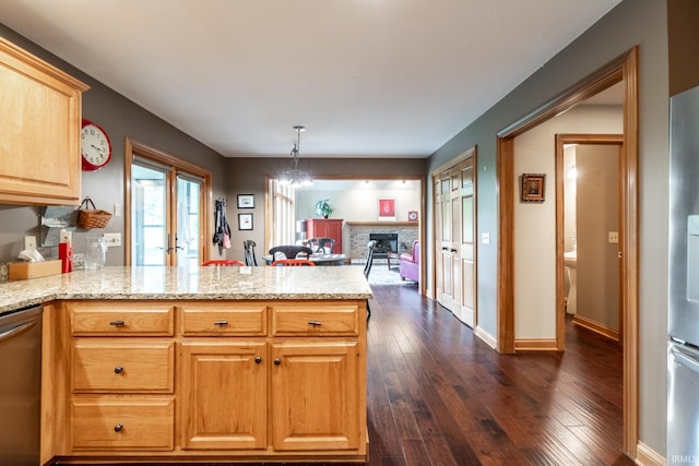 8505 Crenshaw Ct, Fort Wayne, IN 46835 - kitchen featuring dishwasher, a peninsula, dark wood-style floors, french doors, and open floor plan