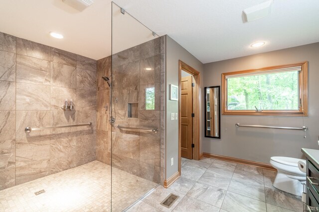 8505 Crenshaw Ct, Fort Wayne, IN 46835 - full bathroom with vanity, baseboards, a tile shower, toilet, and recessed lighting
