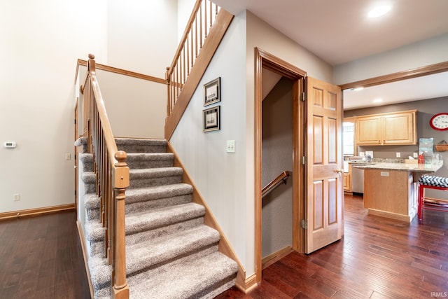 8505 Crenshaw Ct, Fort Wayne, IN 46835 - staircase featuring hardwood / wood-style flooring, baseboards, and recessed lighting