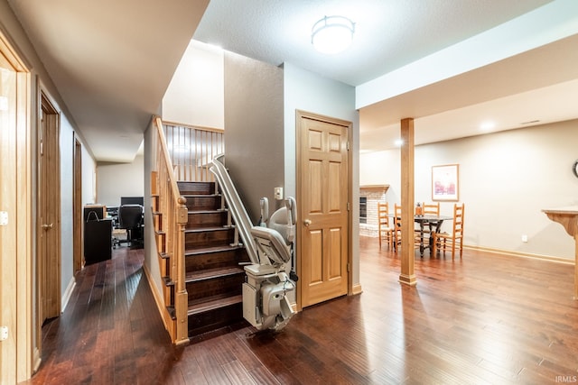 8505 Crenshaw Ct, Fort Wayne, IN 46835 - stairs featuring wood-type flooring and baseboards