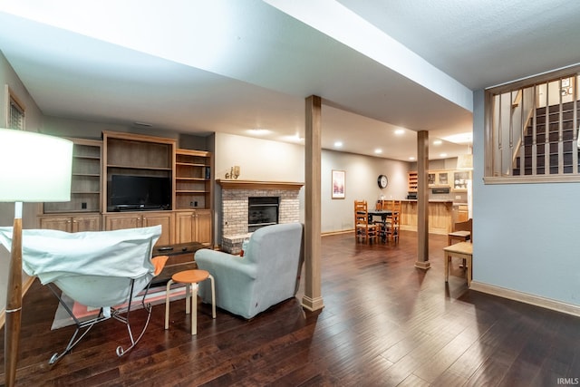8505 Crenshaw Ct, Fort Wayne, IN 46835 - living room with a fireplace, recessed lighting, baseboards, dark wood-style flooring, and stairs
