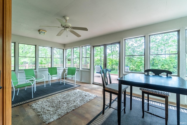 8505 Crenshaw Ct, Fort Wayne, IN 46835 - sunroom / solarium with a ceiling fan, wood-type flooring, and outdoor dining space