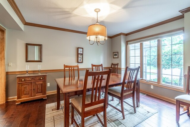 8505 Crenshaw Ct, Fort Wayne, IN 46835 - dining area featuring hardwood / wood-style floors, baseboards, and crown molding