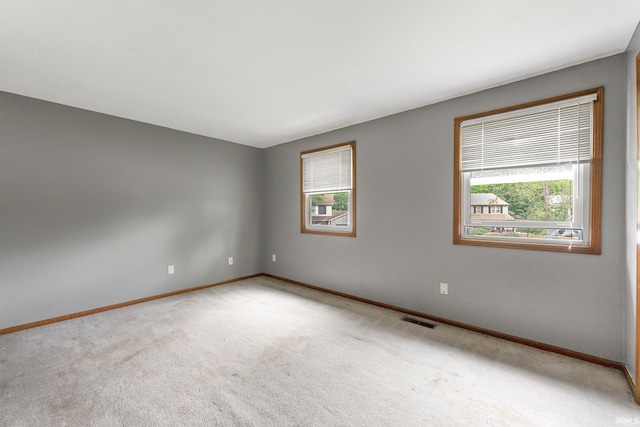 9006 Forestdale Dr, New Haven, IN 46774 - empty room with baseboards and carpet floors