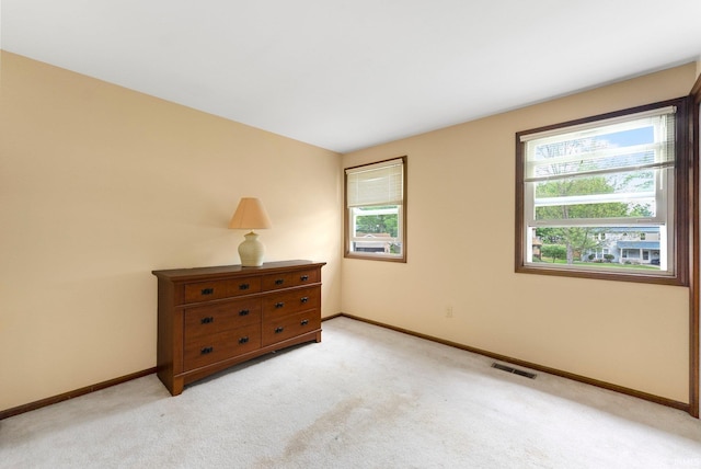 9006 Forestdale Dr, New Haven, IN 46774 - spare room with light colored carpet and baseboards