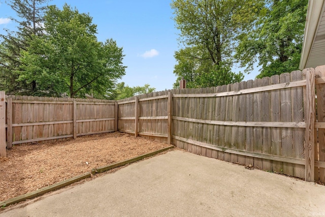 9006 Forestdale Dr, New Haven, IN 46774 - fenced backyard featuring a patio