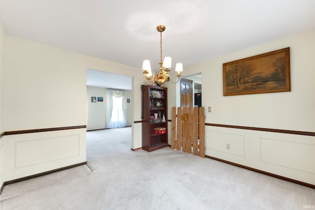 9006 Forestdale Dr, New Haven, IN 46774 - unfurnished dining area with a chandelier and light colored carpet