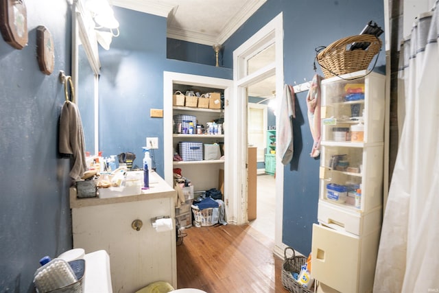 430 S Columbia St, Warsaw, IN 46580 - bathroom featuring crown molding and wood finished floors