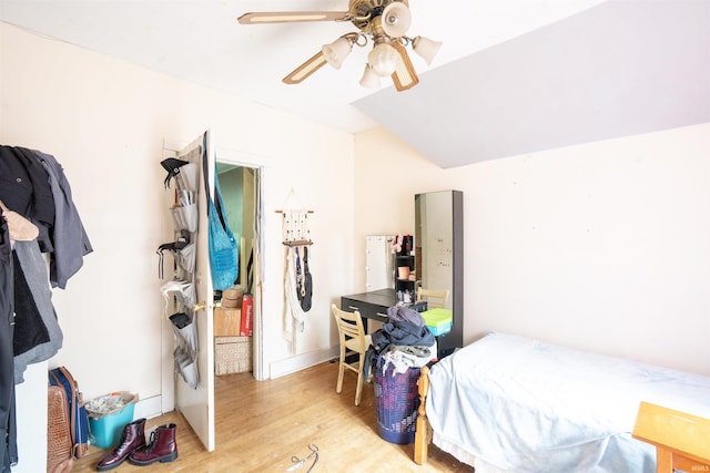 430 S Columbia St, Warsaw, IN 46580 - bedroom with wood finished floors and a ceiling fan
