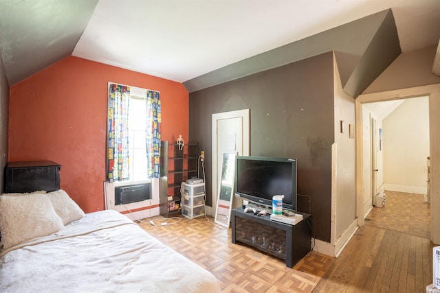 430 S Columbia St, Warsaw, IN 46580 - bedroom with lofted ceiling, parquet floors, cooling unit, and baseboards
