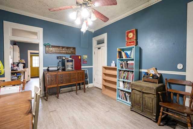 430 S Columbia St, Warsaw, IN 46580 - living area with a ceiling fan, wood finished floors, crown molding, and an office area