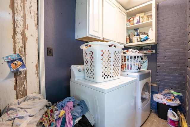 430 S Columbia St, Warsaw, IN 46580 - laundry room featuring separate washer and dryer and cabinet space