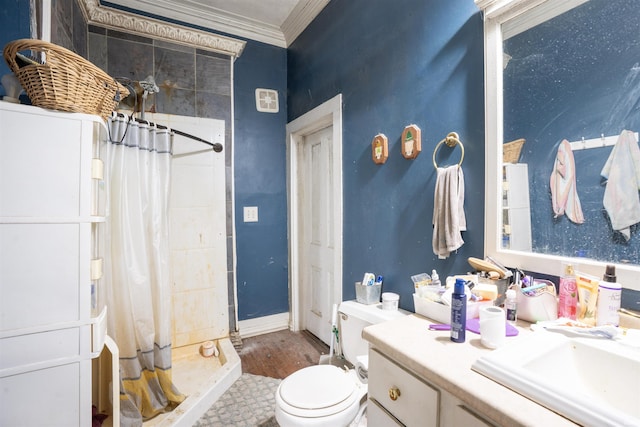 430 S Columbia St, Warsaw, IN 46580 - bathroom with vanity, a shower stall, ornamental molding, toilet, and wood finished floors