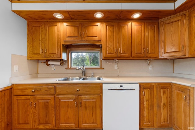 5460 N 550 E, Churubusco, IN 46723 - kitchen with dishwasher, a sink, brown cabinets, and light countertops