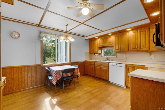 5460 N 550 E, Churubusco, IN 46723 - kitchen featuring dishwasher, light countertops, wainscoting, light wood-style floors, and a sink