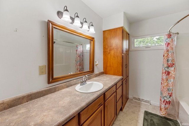 101 E Maple St, Fowler, IN 47944 - bathroom featuring vanity and shower / bathtub combination with curtain