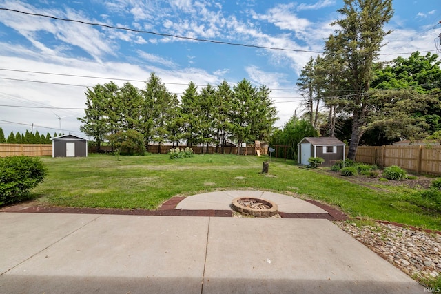 101 E Maple St, Fowler, IN 47944 - view of yard featuring an outdoor fire pit and a patio area