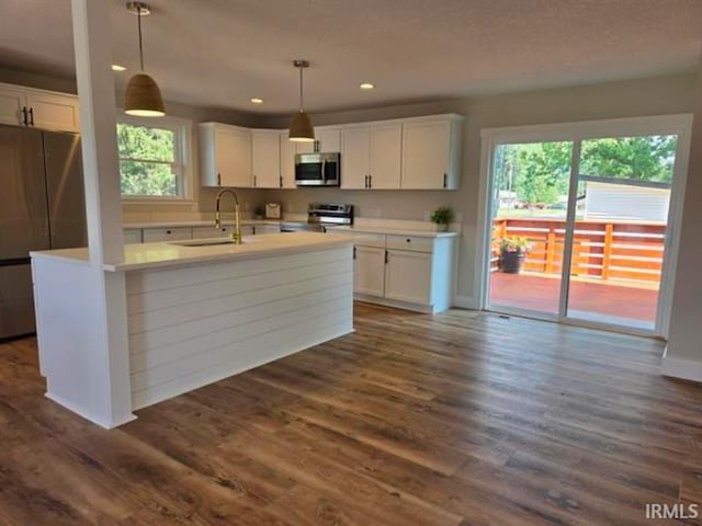 5317 Stellhorn Rd, Fort Wayne, IN 46815 - kitchen featuring appliances with stainless steel finishes, a sink, white cabinetry, recessed lighting, and light countertops