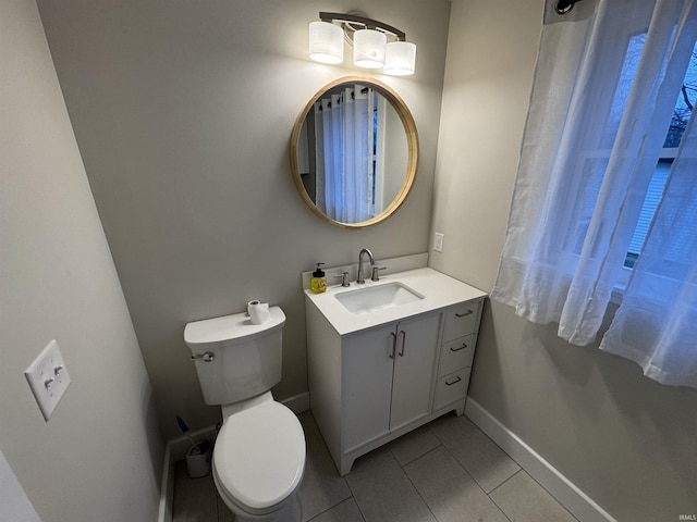 5317 Stellhorn Rd, Fort Wayne, IN 46815 - bathroom featuring vanity, baseboards, tile patterned flooring, and toilet