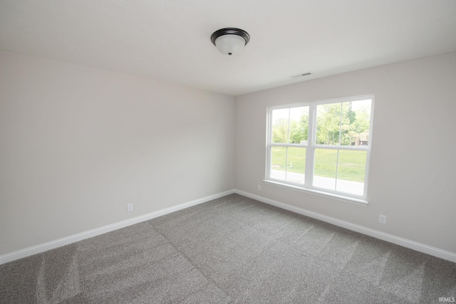 909 S Hoke Ave, Frankfort, IN 46041 - carpeted spare room with baseboards