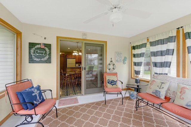 2104 Shady Ln, Garrett, IN 46738 - sitting room with a chandelier, a ceiling fan, and baseboards