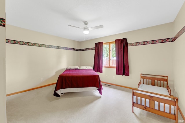 2104 Shady Ln, Garrett, IN 46738 - carpeted bedroom featuring baseboards and ceiling fan