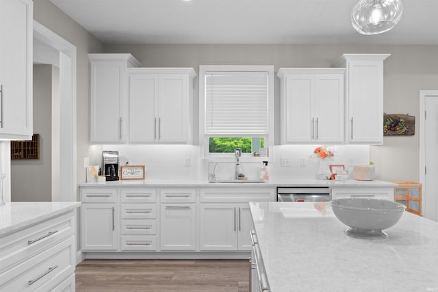7018 S 350 St E, Lafayette, IN 47909 - kitchen with a sink, white cabinetry, dishwasher, and backsplash