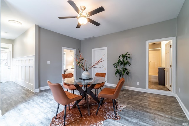807 W Washington Blvd, Fort Wayne, IN 46802 - dining room featuring wood finished floors, baseboards, and ceiling fan